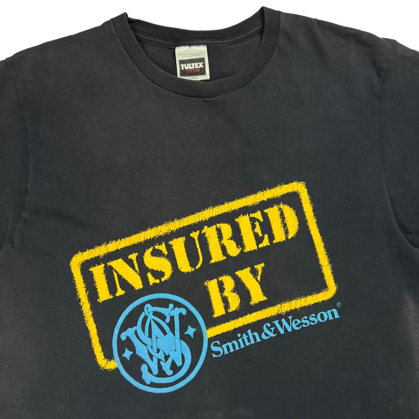 Vintage 90s Insured By Smith & Wesson faded gun tee (L)