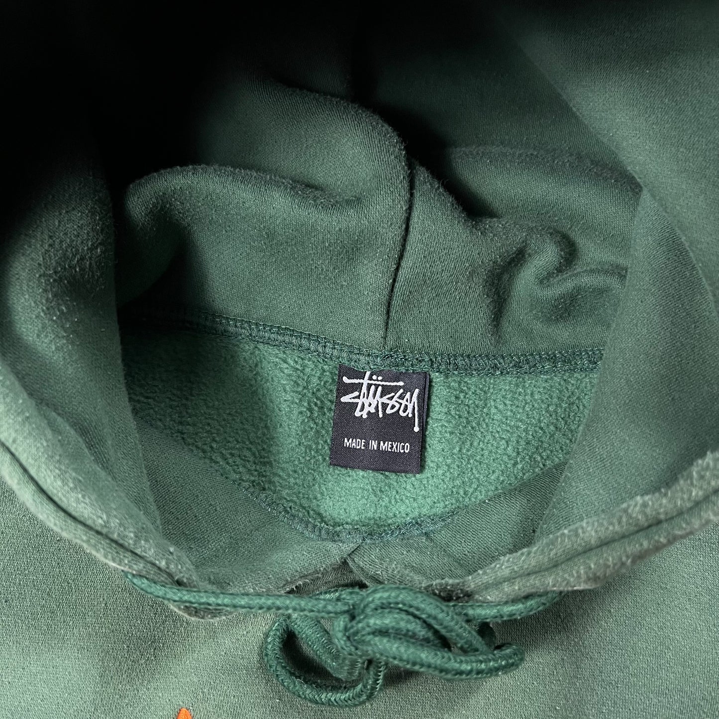 Vintage Y2K Stussy International faded green hoodie (M)