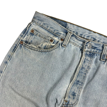 Vintage 90s Levi’s 501 button fly distressed & repaired USA made denim jeans (33x29)