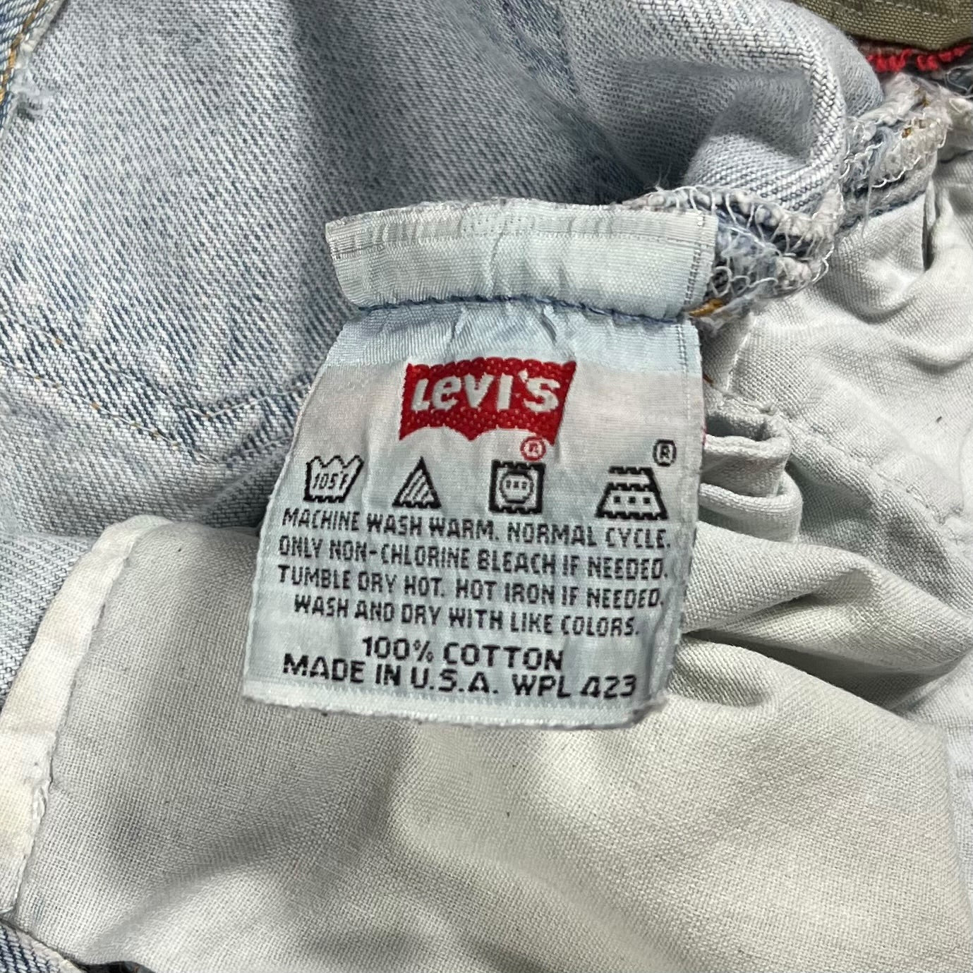 Vintage 90s Levi’s 501 button fly distressed & repaired USA made denim jeans (33x29)