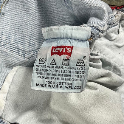 Vintage 90s Levi’s 501 button fly distressed & repaired USA made denim jeans (33x29)