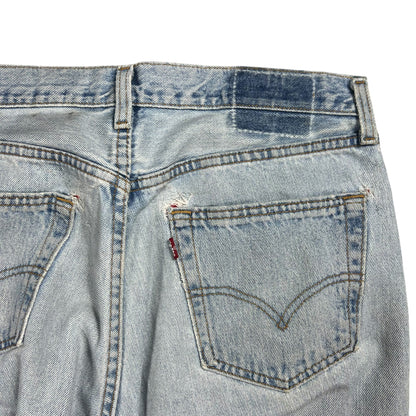 Vintage 90s Levi’s 501 button fly distressed & repaired USA made denim jeans (33x29)