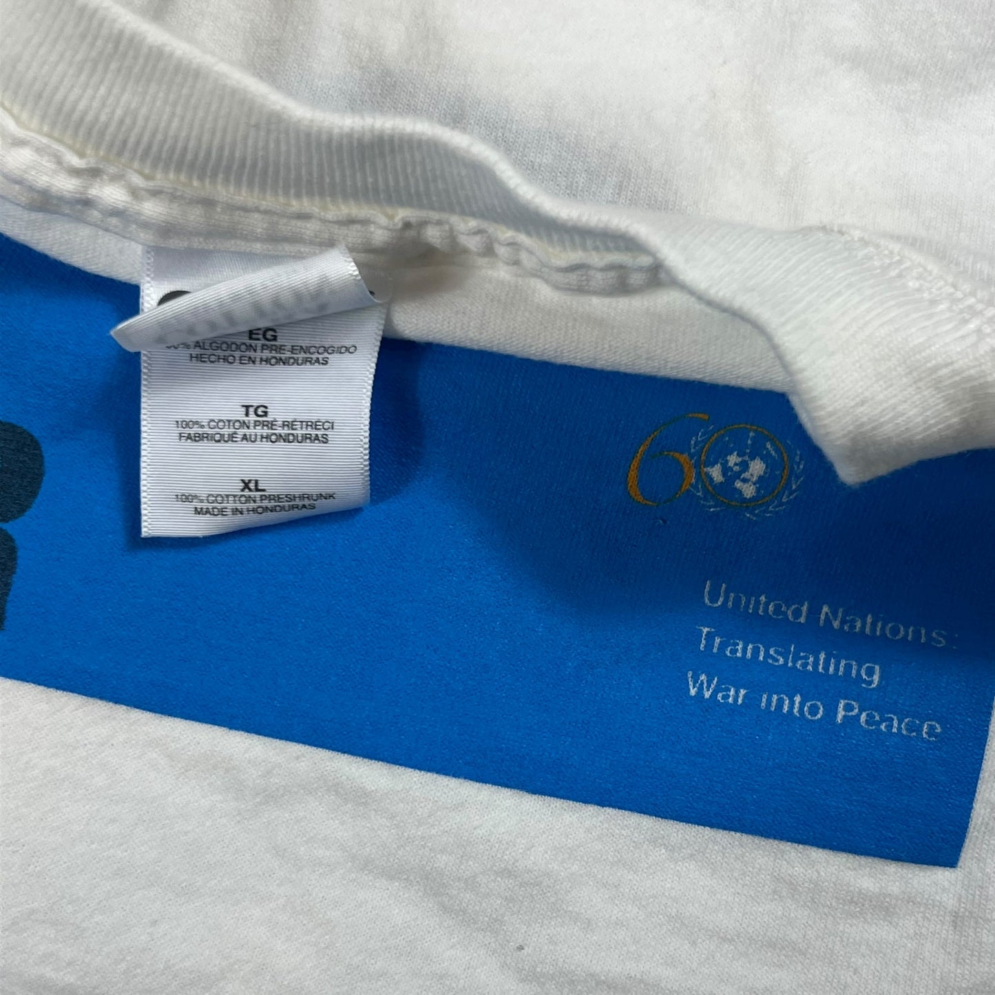 Vintage Y2K PEACE vs WAR Dove United Nations art tee (XL)