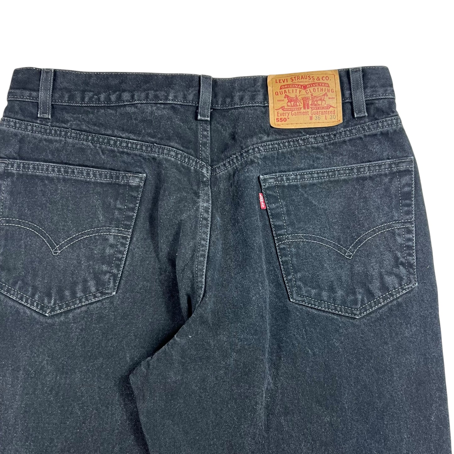 Vintage 90s Levi’s 550 black denim jeans (33x28)
