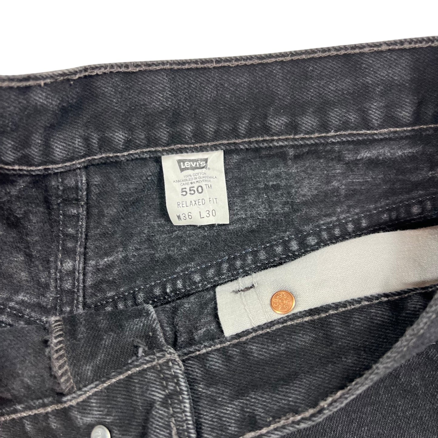 Vintage 90s Levi’s 550 black denim jeans (33x28)