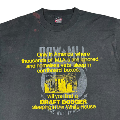 Vintage 80s “Only in America will you find a DRAFT DODGER sleeping in the White House faded tee (XL)