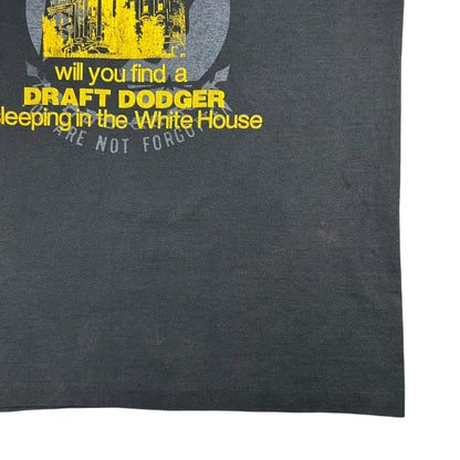 Vintage 80s “Only in America will you find a DRAFT DODGER sleeping in the White House faded tee (XL)