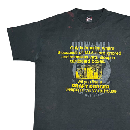 Vintage 80s “Only in America will you find a DRAFT DODGER sleeping in the White House faded tee (XL)