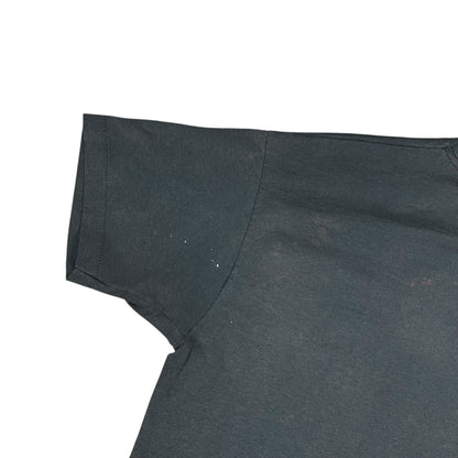 Vintage 80s “Only in America will you find a DRAFT DODGER sleeping in the White House faded tee (XL)