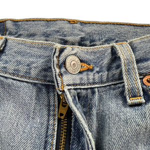 Vintage 90s Levi’s 550 distressed denim jeans (32x30)