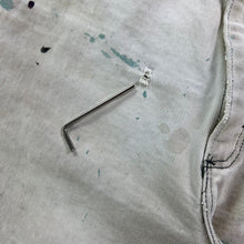 Load image into Gallery viewer, Vintage 90s Wrangler paint splattered distressed beige denim jean shorts jorts (34)