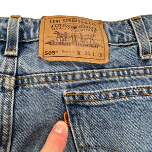 Vintage 90s Levi’s 505 orange tab denim jean shorts (32)