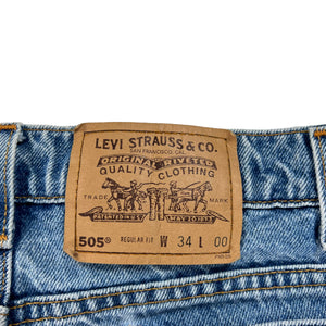 Vintage 90s Levi’s 505 orange tab denim jean shorts (32)